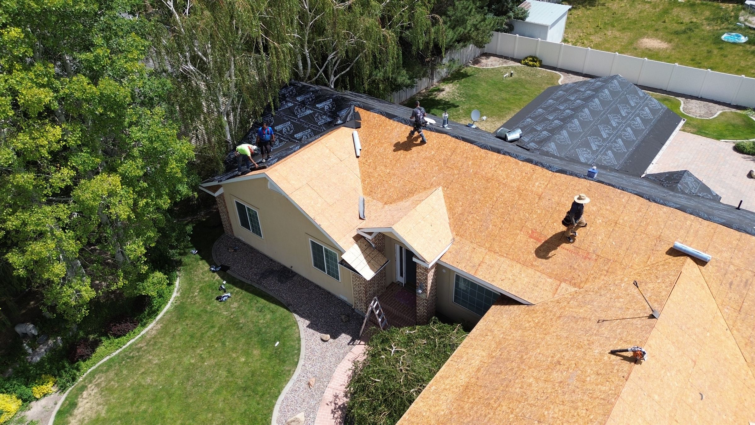 Roof installation crew at work