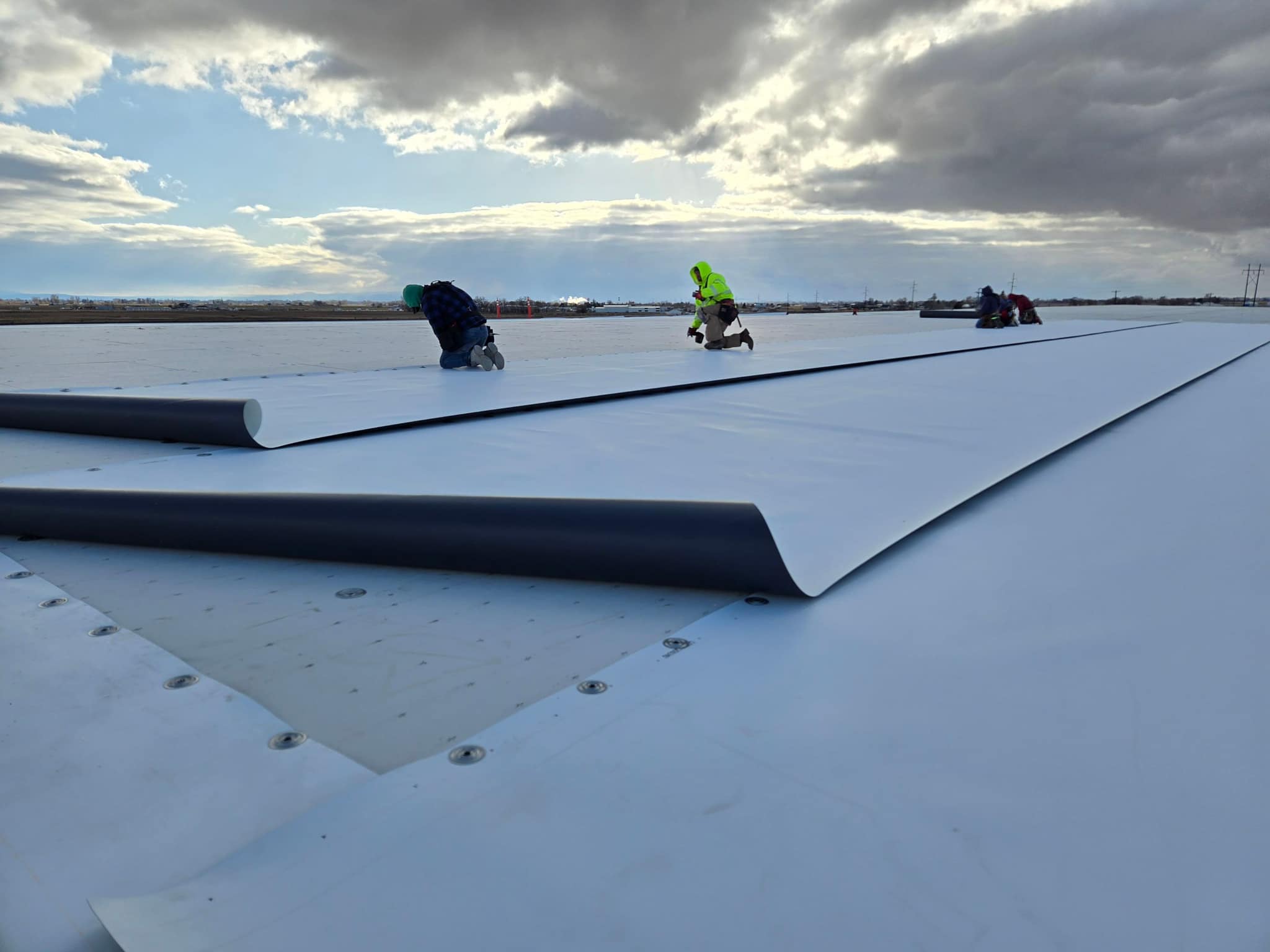 Applying protective roof coating